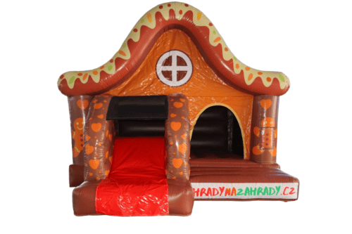 Nafukovací dětský domeček s perníkovým motivem a skluzavkou, ideální pro venkovní hry a zábavu dětí.