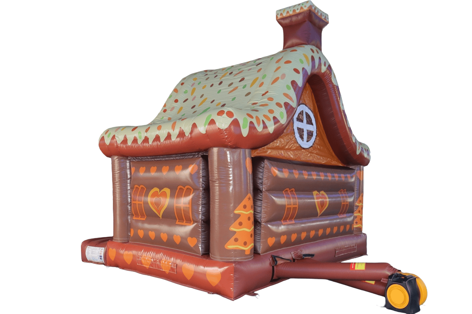 Dětský nafukovací hrad s perníkovým motivem a cukrovou polevou, ideální pro venkovní hry a oslavy.
